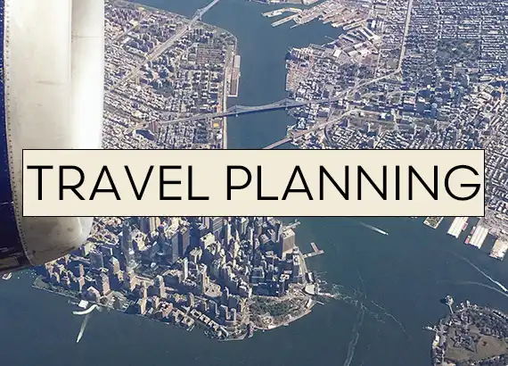 Manhattan New York from an airplane with the words Travel Planning